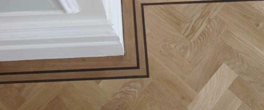Hardwood flooring designs – picture frame border | Parquet Floor Fitters
